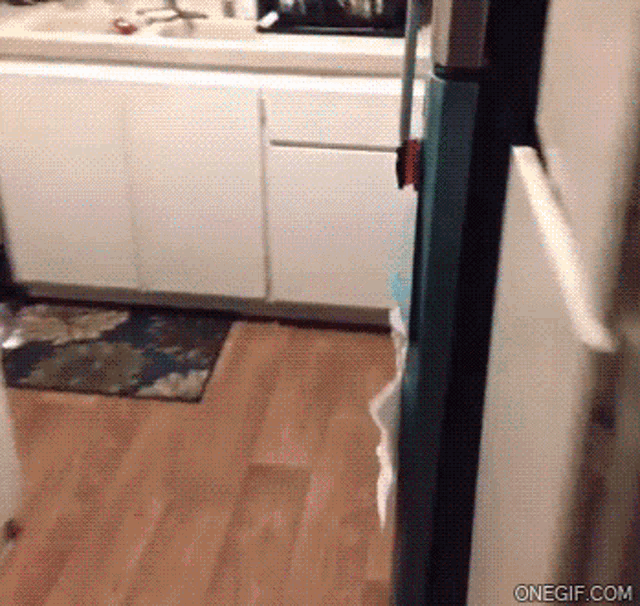 fridge-busted-snacking-caught.gif